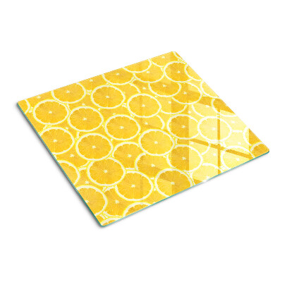 Planche à découper en verre Tranches de citron sur fond jaune