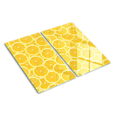 Planche à découper en verre Tranches de citron sur fond jaune