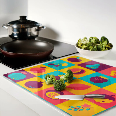 Planche à découper en verre Motif de fruits dans des carrés colorés