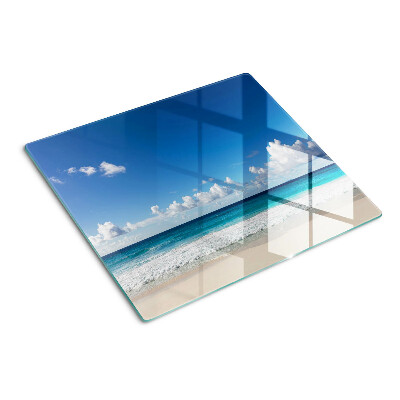 Planche à découper en verre Plage avec eau turquoise et nuages