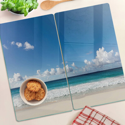 Planche à découper en verre Plage avec eau turquoise et nuages
