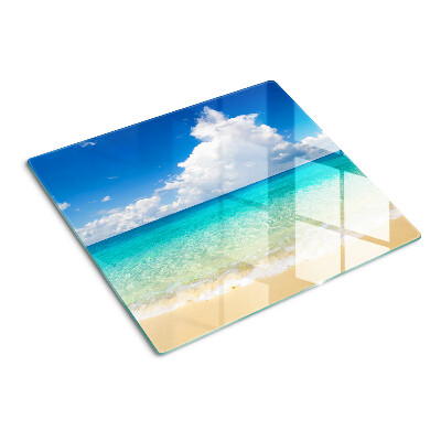 Planche à découper verre Plage avec eau turquoise et nuages