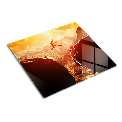 Planche à découper en verre Sauter dans les montagnes au coucher du soleil