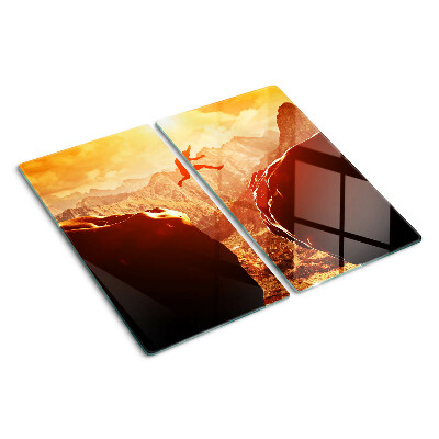 Planche à découper en verre Sauter dans les montagnes au coucher du soleil