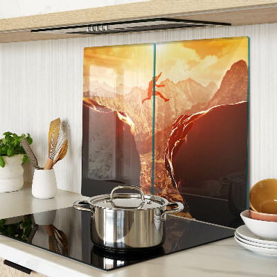 Planche à découper en verre Sauter dans les montagnes au coucher du soleil