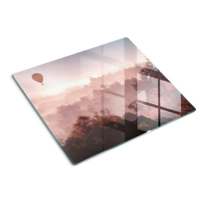 Planche à découper verre Montgolfière au-dessus du paysage