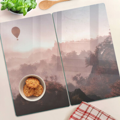 Planche à découper verre Montgolfière au-dessus du paysage