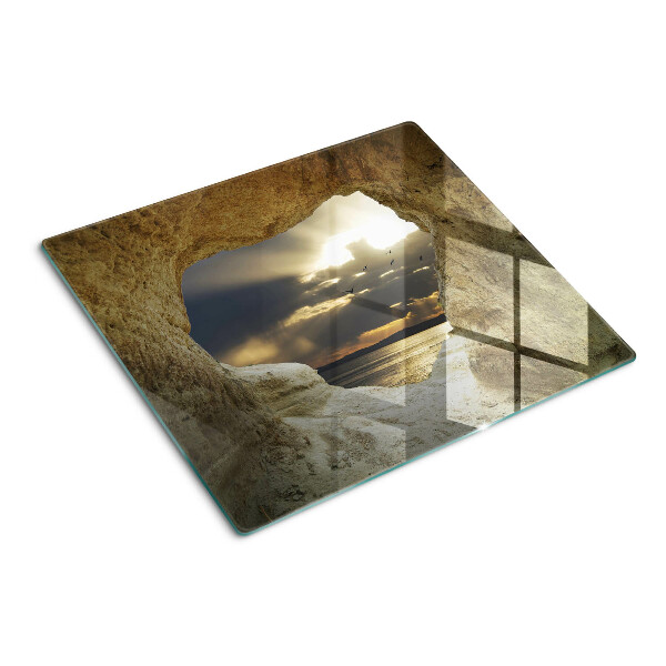 Planche à découper verre Vue sur la mer à travers la grotte
