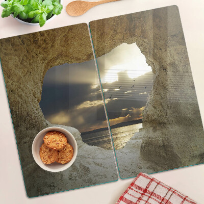 Planche à découper verre Vue sur la mer à travers la grotte