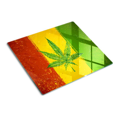 Planche à découper en verre Feuille de chanvre sur fond coloré