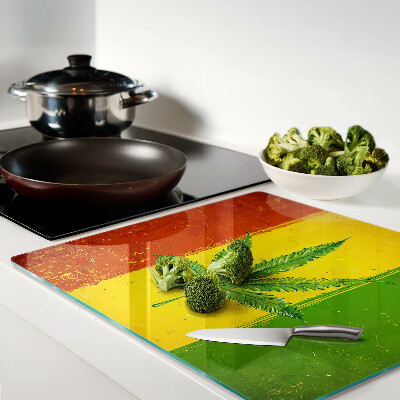 Planche à découper en verre Feuille de chanvre sur fond coloré