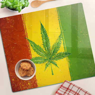 Planche à découper en verre Feuille de chanvre sur fond coloré
