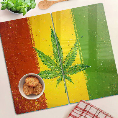 Planche à découper en verre Feuille de chanvre sur fond coloré