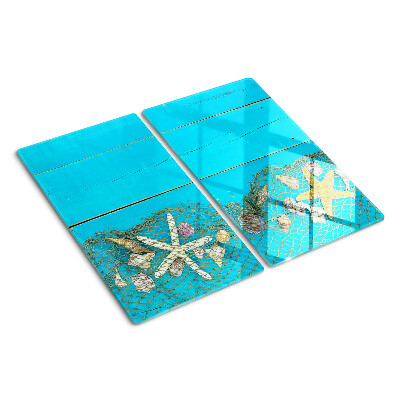 Planche à découper verre Coquillages et étoiles de mer dans un filet