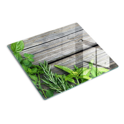 Planche à découper verre Herbes vertes sur fond de bois