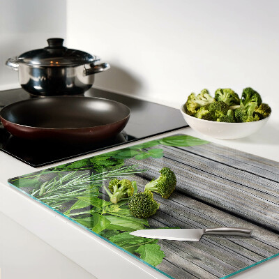 Planche à découper verre Herbes vertes sur fond de bois