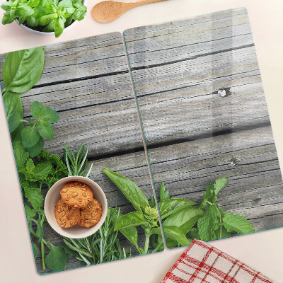 Planche à découper verre Herbes vertes sur fond de bois