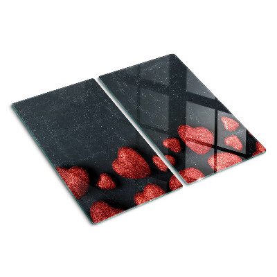 Planche à découper en verre Coeurs rouges sur fond sombre