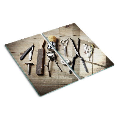 Planche à découper en verre Outils de coiffure sur fond de bois