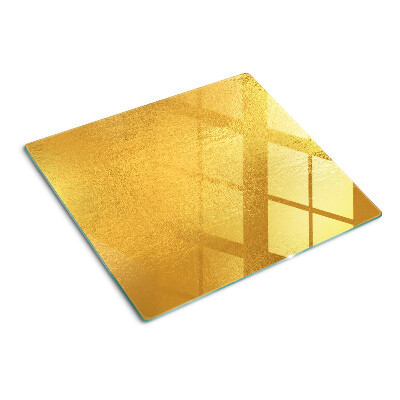 Planche à découper verre Surface dorée avec reflets