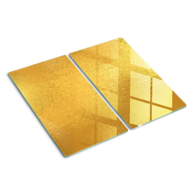 Planche à découper verre Surface dorée avec reflets