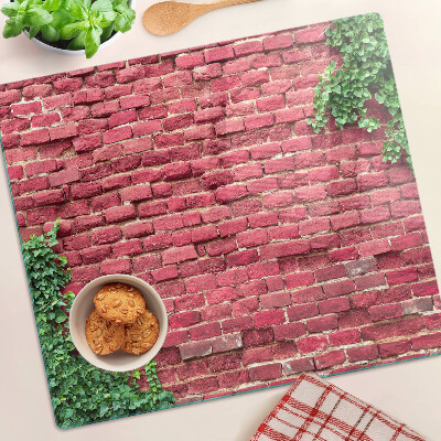 Planche à découper en verre Mur de briques avec des plantes