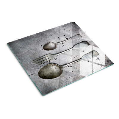 Planche à découper verre Couverts sur fond de béton