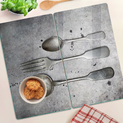 Planche à découper verre Couverts sur fond de béton