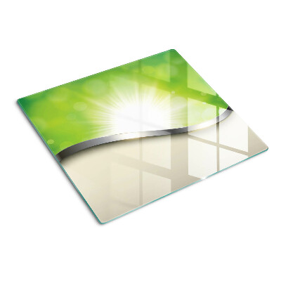 Planche à découper verre Bokeh vert avec des rayons de lumière