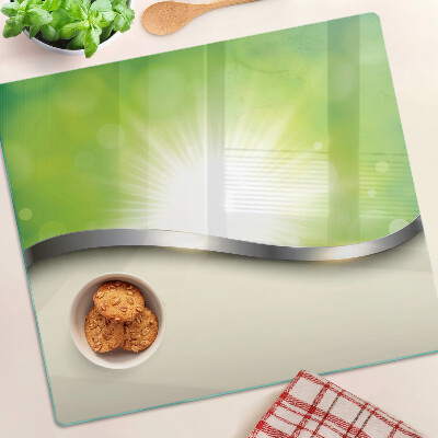 Planche à découper verre Bokeh vert avec des rayons de lumière