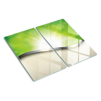 Planche à découper verre Bokeh vert avec des rayons de lumière