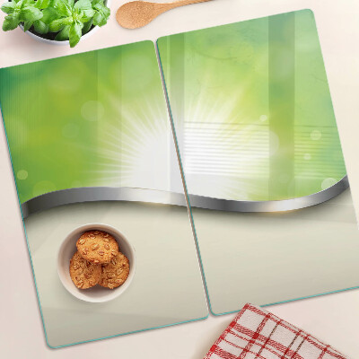Planche à découper verre Bokeh vert avec des rayons de lumière