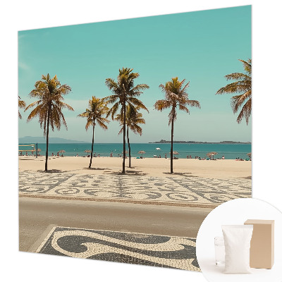 Papier peint panoramique tendance avec une plage bordée de palmiers