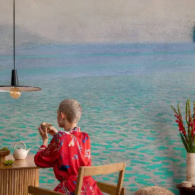 Papier peint panoramique chambre adulte avec un motif évoquant l'eau turquoise