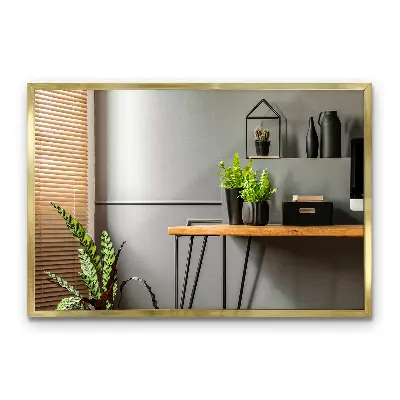 Miroir mural à cadre doré élégant