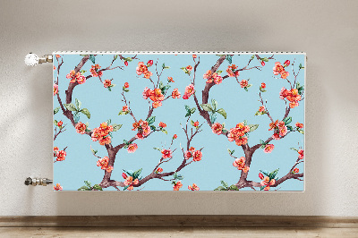 Un tapis avec un imprimé radiateur Un arbre en fleurs