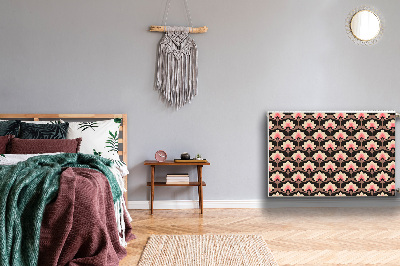 Un tapis avec un imprimé radiateur Motif floral