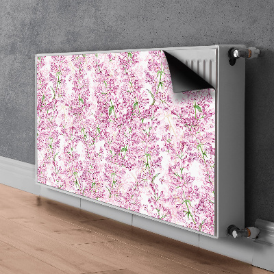 Un tapis avec un imprimé radiateur Fleurs lilas