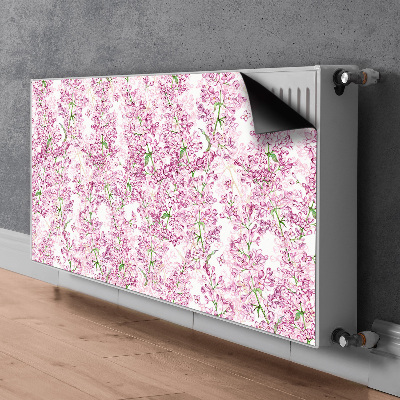 Un tapis avec un imprimé radiateur Fleurs lilas