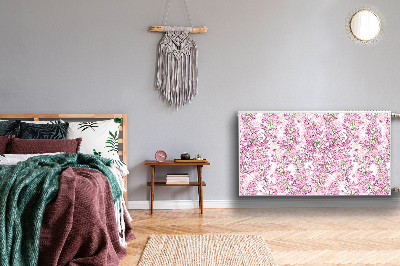 Un tapis avec un imprimé radiateur Fleurs lilas