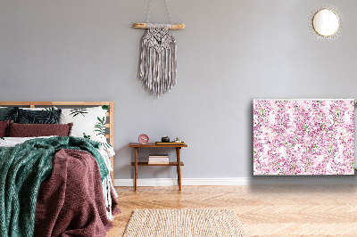 Un tapis avec un imprimé radiateur Fleurs lilas