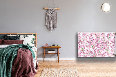 Un tapis avec un imprimé radiateur Fleurs lilas