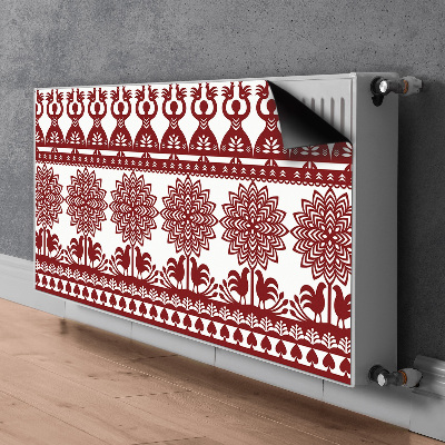 Un tapis avec un imprimé radiateur Découpes de kurpie