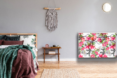 Un tapis avec un imprimé radiateur Fleurs aquarelles