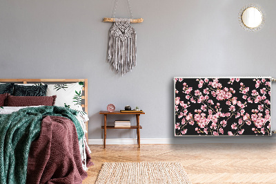 Un tapis avec un imprimé radiateur Fleurs de cerisier