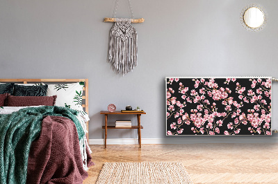 Un tapis avec un imprimé radiateur Fleurs de cerisier