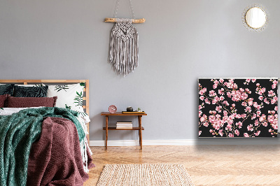 Un tapis avec un imprimé radiateur Fleurs de cerisier