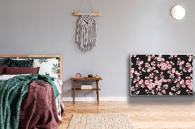 Un tapis avec un imprimé radiateur Fleurs de cerisier