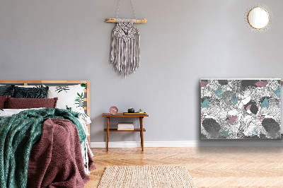 Un tapis avec un imprimé radiateur Motif floral