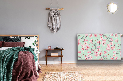 Un tapis avec un imprimé radiateur Fleurs de cerisier